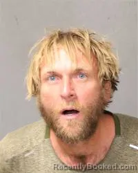 Mugshot of John William Dunn booked in Bernalillo County, New Mexico on August 7, 2026
