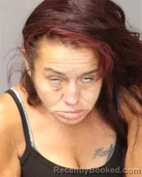 Mugshot of Rebecca Elisa Corral booked in Bernalillo County, New Mexico on August 8, 2026
