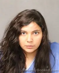 Mugshot of Israella Molina booked in Bernalillo County, New Mexico on August 8, 2026