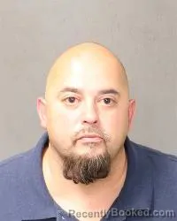 Mugshot of Andres Miguel Romero booked in Bernalillo County, New Mexico on August 9, 2026