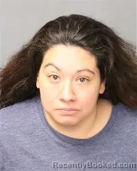 Mugshot of Casandra Genavive Martinez booked in Bernalillo County, New Mexico on August 10, 2026