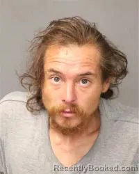 Mugshot of Juan Miguel Martinez booked in Bernalillo County, New Mexico on August 11, 2026