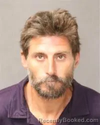 Mugshot of Dustin Andrew Mosow booked in Bernalillo County, New Mexico on August 11, 2026
