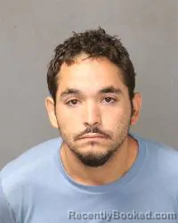 Mugshot of Adrian Benavidez-Moore booked in Bernalillo County, New Mexico on August 11, 2026