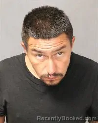 Mugshot of Eric Robert Sena booked in Bernalillo County, New Mexico on August 11, 2026