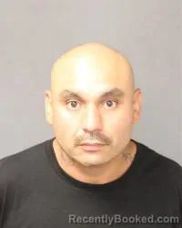 Mugshot of Ernie Victor Sandoval booked in Bernalillo County, New Mexico on August 11, 2026