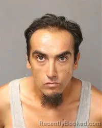 Mugshot of Eric L Aragon booked in Bernalillo County, New Mexico on August 12, 2026