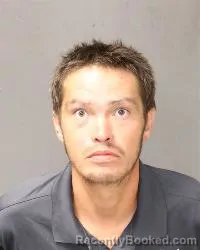 Mugshot of John Anthony Lopez booked in Bernalillo County, New Mexico on August 12, 2026