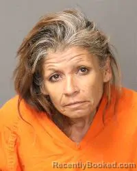 Mugshot of Justa Susan Saavedra booked in Bernalillo County, New Mexico on August 12, 2026