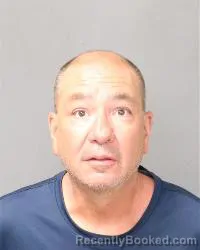 Mugshot of John Jules Alcouffe booked in Bernalillo County, New Mexico on August 13, 2026
