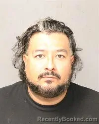 Mugshot of Raul Guevara booked in Bernalillo County, New Mexico on August 13, 2026