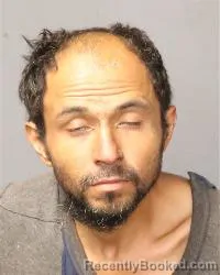 Mugshot of Miguel Angel Flores booked in Bernalillo County, New Mexico on August 13, 2026
