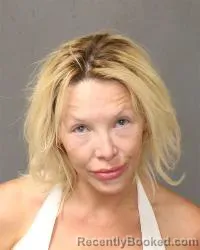 Mugshot of Amy Brooke Apodaca booked in Bernalillo County, New Mexico on August 14, 2026