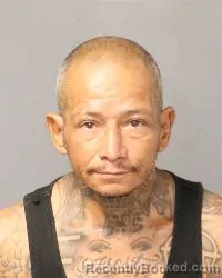 Mugshot of Juan Michael Flores booked in Bernalillo County, New Mexico on August 18, 2026