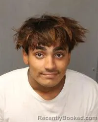 Mugshot of Carlos Richard Perea booked in Bernalillo County, New Mexico on August 18, 2026
