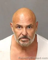 Mugshot of John Baptist Sandoval booked in Bernalillo County, New Mexico on August 18, 2026