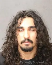 Mugshot of Devin Elias Ray booked in Bernalillo County, New Mexico on August 21, 2026