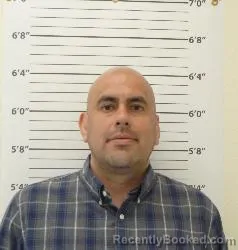 Mugshot of Enrique Alonso Reyes-Nevarez booked in Bernalillo County, New Mexico on August 21, 2026