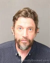 Mugshot of Christopher Mark Olsen booked in Bernalillo County, New Mexico on August 21, 2026