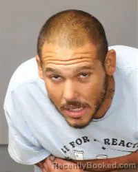Mugshot of Justin Paul Reeves booked in Bernalillo County, New Mexico on August 25, 2026