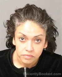 Mugshot of Crystal Monique Garcia booked in Bernalillo County, New Mexico on August 26, 2026