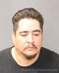 Mugshot of Marty Garcia-Parra booked in Bernalillo County, New Mexico on August 27, 2026