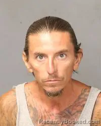 Mugshot of Jason Eluterio Trujillo booked in Bernalillo County, New Mexico on August 27, 2026