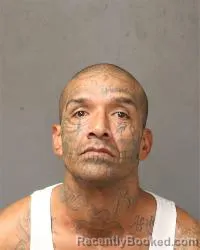 Mugshot of Justin Johnny Pacheco booked in Bernalillo County, New Mexico on August 28, 2026