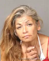 Mugshot of Justa Susan Saavedra booked in Bernalillo County, New Mexico on August 29, 2026