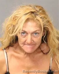 Mugshot of Carmen Rose Woody booked in Bernalillo County, New Mexico on September 2, 2026