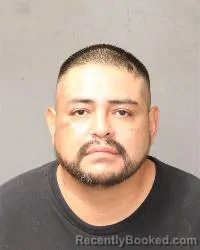 Mugshot of Miguel Ortigoze booked in Bernalillo County, New Mexico on September 27, 2026