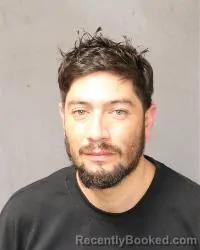 Mugshot of Zeke David Dominguez booked in Bernalillo County, New Mexico on September 28, 2026