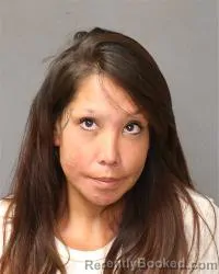 Mugshot of Camille Saavedra booked in Bernalillo County, New Mexico on October 1, 2026