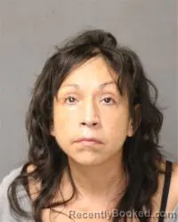 Mugshot of Melissia Martinez booked in Bernalillo County, New Mexico on October 1, 2026