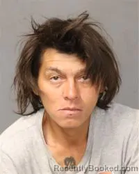 Mugshot of John James Romero booked in Bernalillo County, New Mexico on October 2, 2026