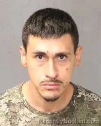 Mugshot of Rey Andrew Chavez booked in Bernalillo County, New Mexico on October 6, 2026