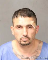 Mugshot of Gilbert Angelo Serrano booked in Bernalillo County, New Mexico on October 6, 2026