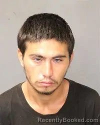 Mugshot of Aaron C Martinez booked in Bernalillo County, New Mexico on October 8, 2026