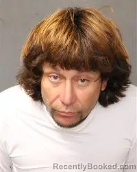 Mugshot of Eric Marcus Madrigal booked in Bernalillo County, New Mexico on October 13, 2026