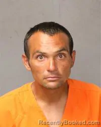 Mugshot of Daniel Devine booked in Bernalillo County, New Mexico on October 13, 2026