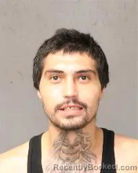 Mugshot of Xavier J Apodaca booked in Bernalillo County, New Mexico on October 14, 2026