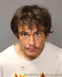 Mugshot of Johnathan Mansuy booked in Bernalillo County, New Mexico on October 14, 2026