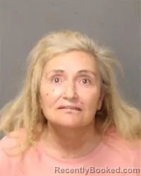Mugshot of Aurora Josefita Lujan booked in Bernalillo County, New Mexico on October 14, 2026
