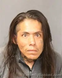 Mugshot of Olson Tsosie booked in Bernalillo County, New Mexico on October 21, 2026