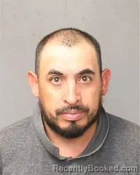 Mugshot of Jose Martinez-Espinoza booked in Bernalillo County, New Mexico on October 22, 2026