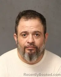 Mugshot of Marco Antonio Butchard booked in Bernalillo County, New Mexico on October 22, 2026