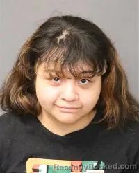 Mugshot of Carmela Garcia booked in Bernalillo County, New Mexico on October 24, 2026
