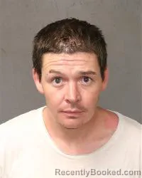 Mugshot of Travis Madron booked in Bernalillo County, New Mexico on October 24, 2026