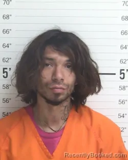 Mugshot of ALAZHAR JOSE LUCERO booked in Curry County, New Mexico on March 22, 2026