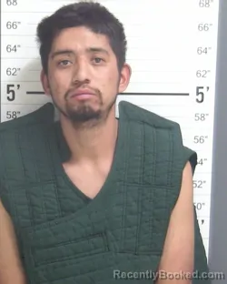 Mugshot of CARLOS ALEX DELGADILLO booked in Curry County, New Mexico on April 3, 2026